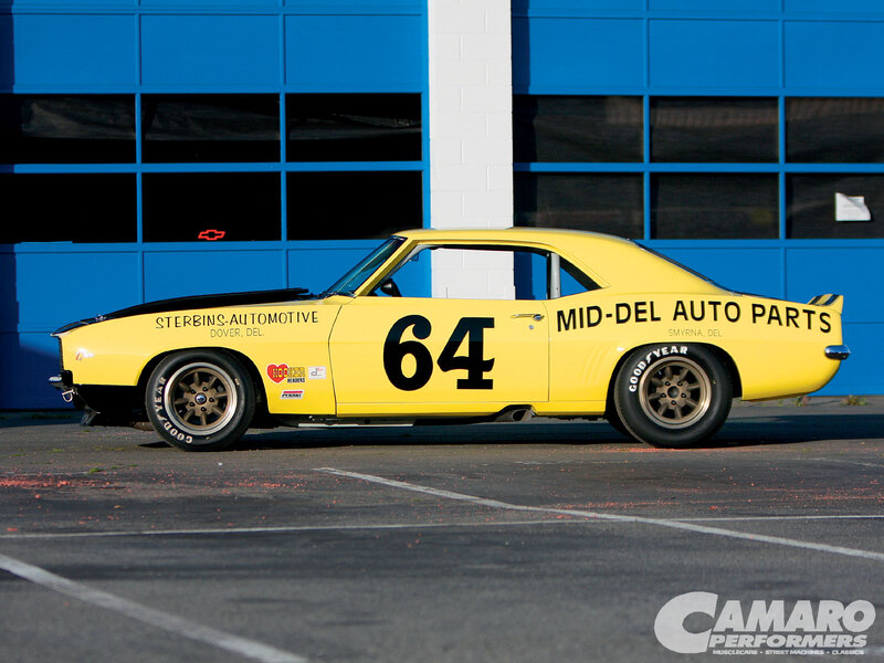 Yellow race car with number 64