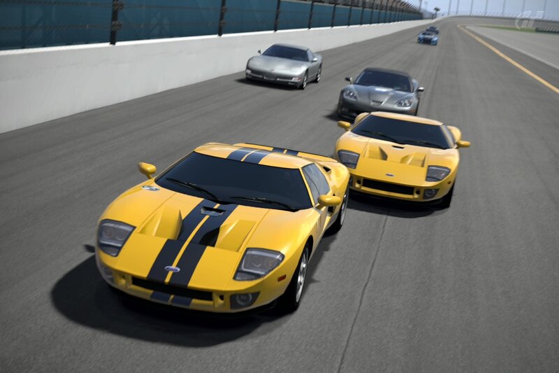 Yellow race cars on a track