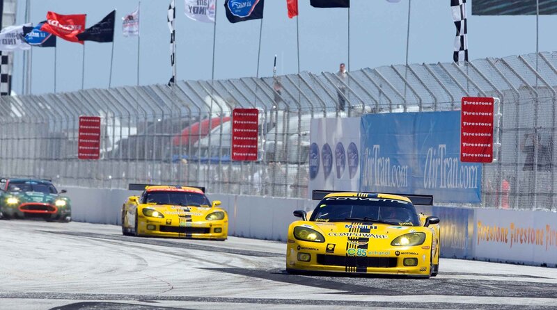 Yellow race cars on track