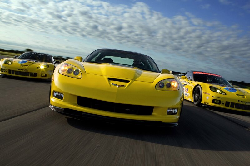 Yellow race cars on track