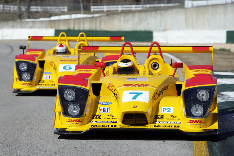 Yellow race cars on track