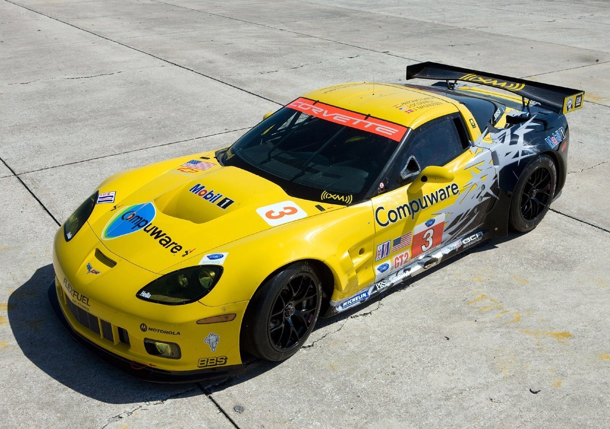 Yellow racing Corvette on track