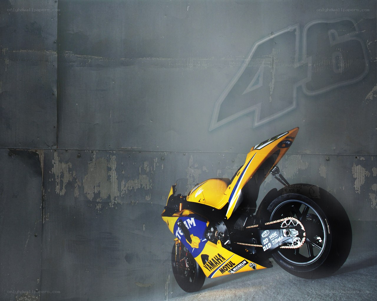 Yellow racing motorcycle on display