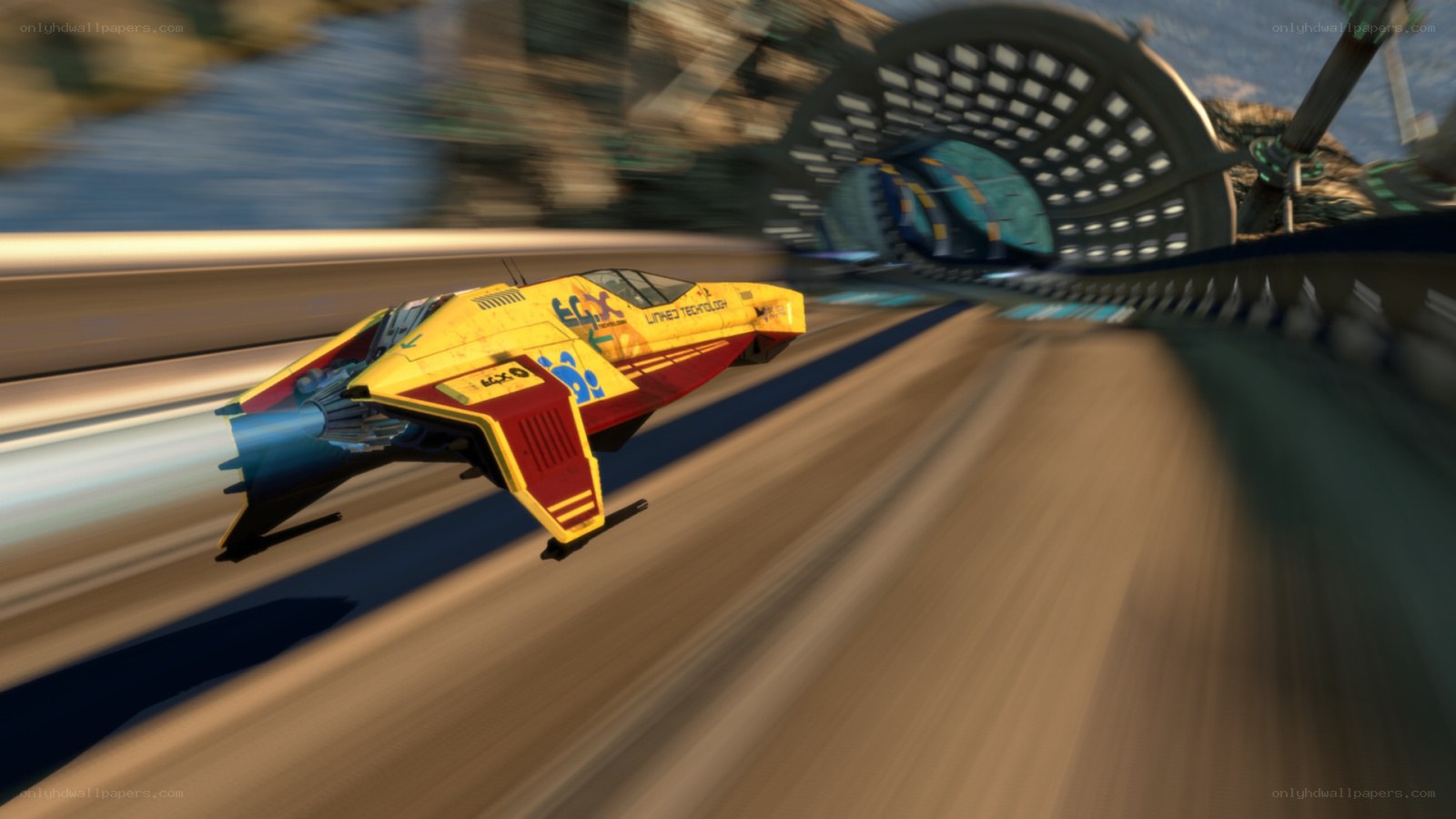 yellow racing vehicle on track
