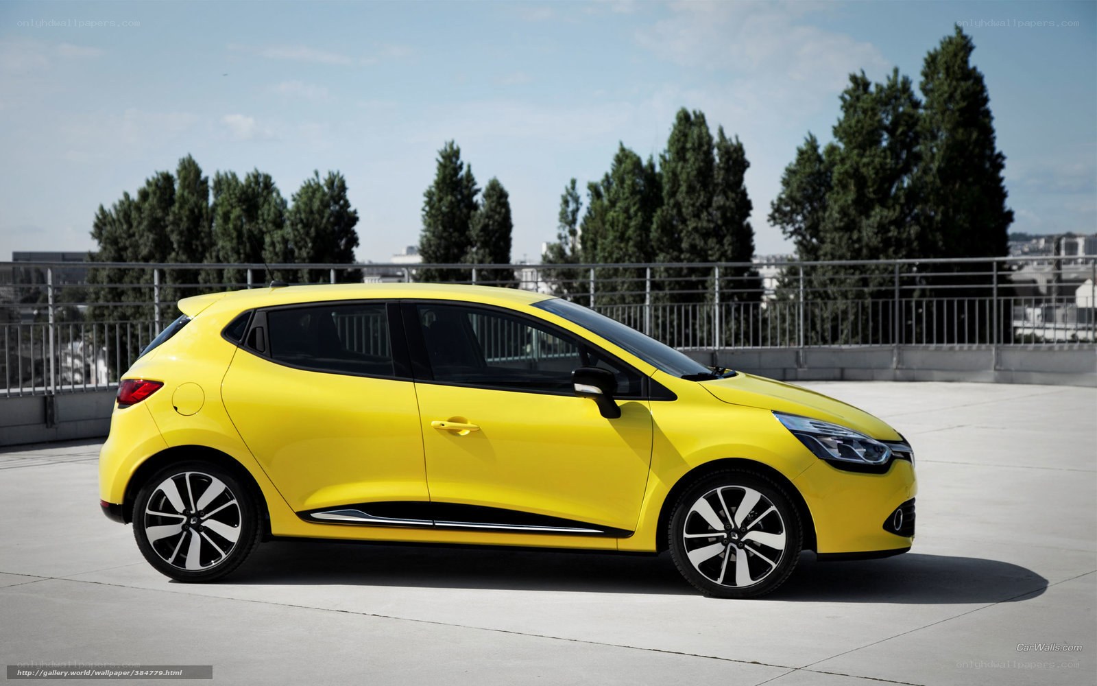 yellow renault car on rooftop