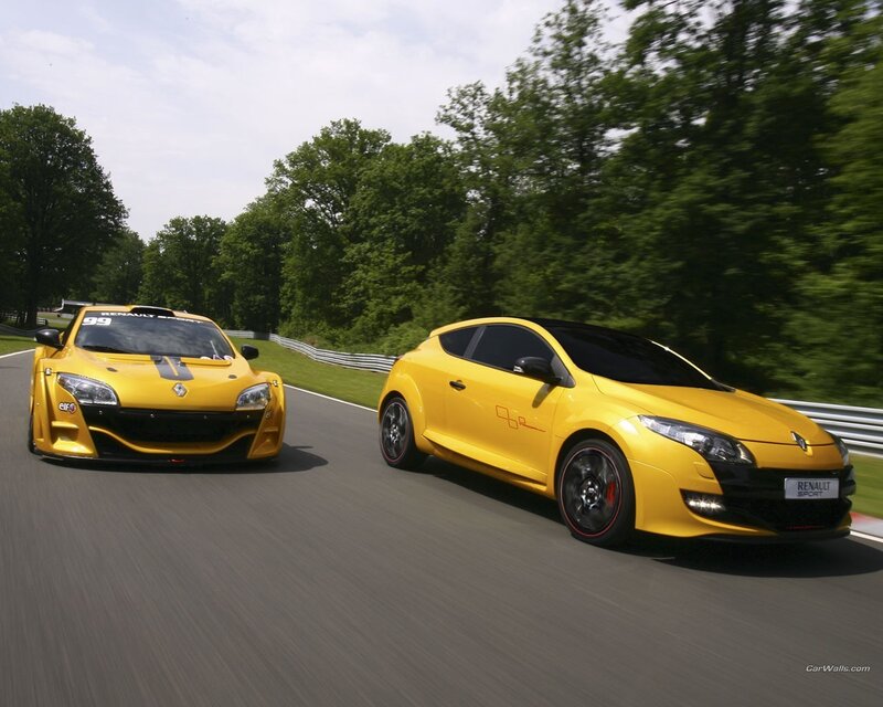 Yellow Renault cars on a racetrack