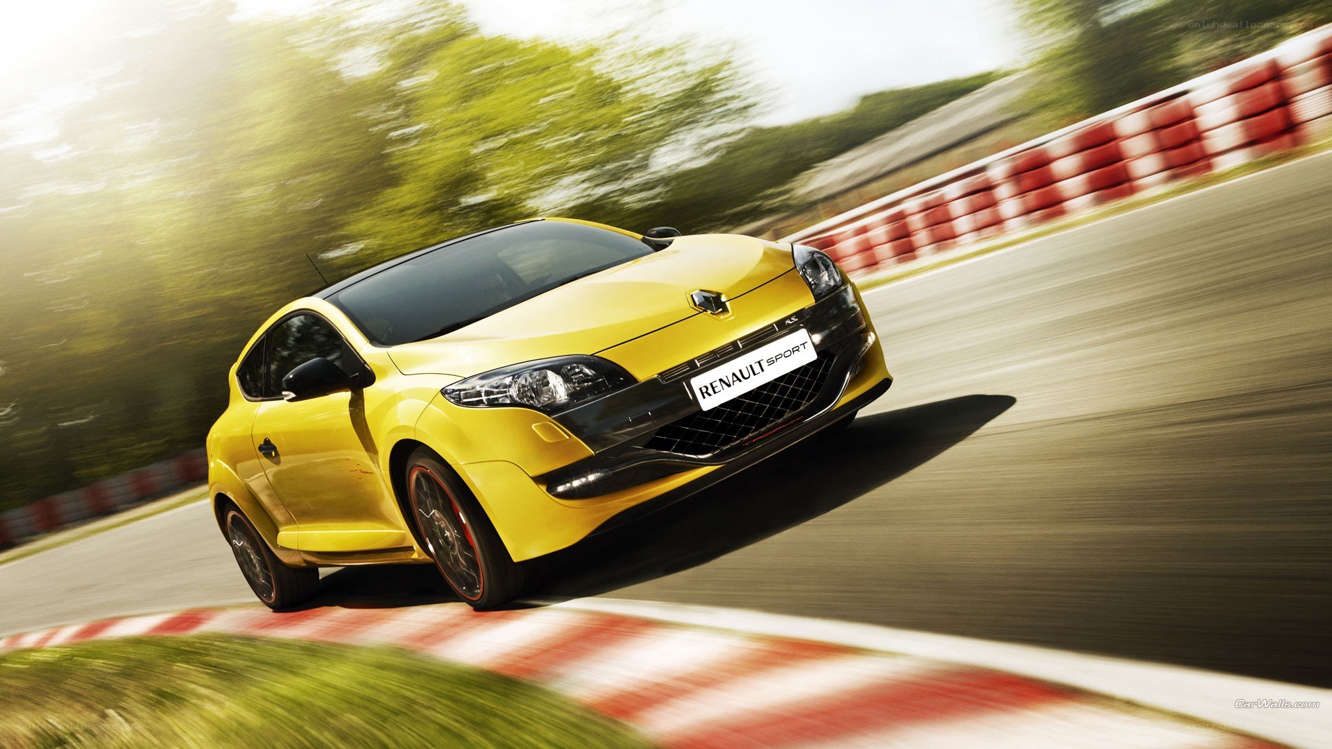 Yellow Renault on a racetrack