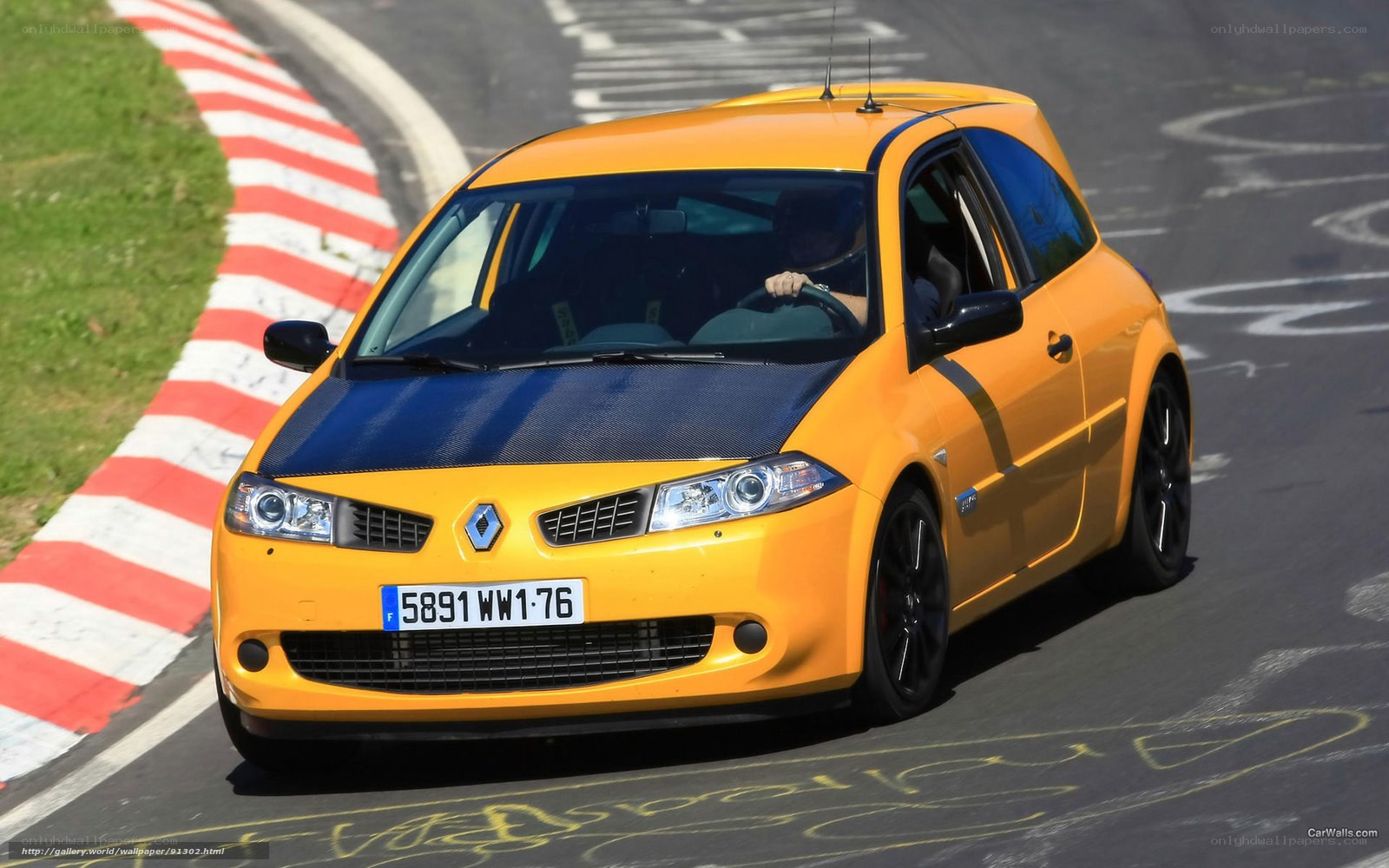 yellow renault on racetrack