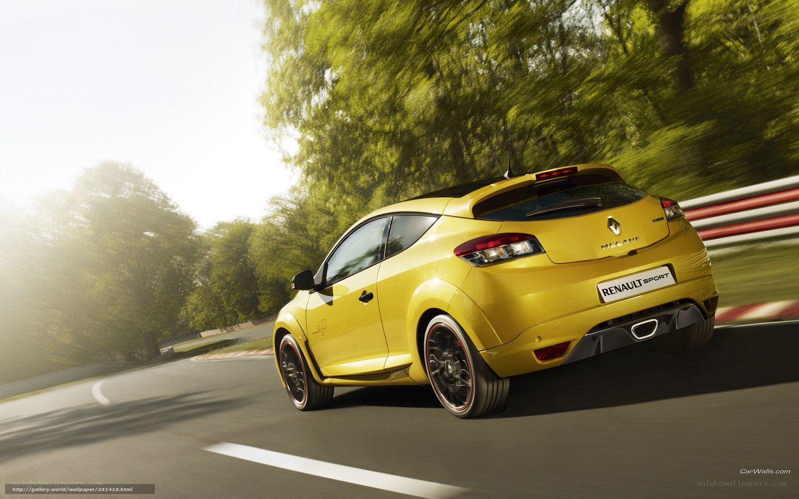 yellow renault sport car on track