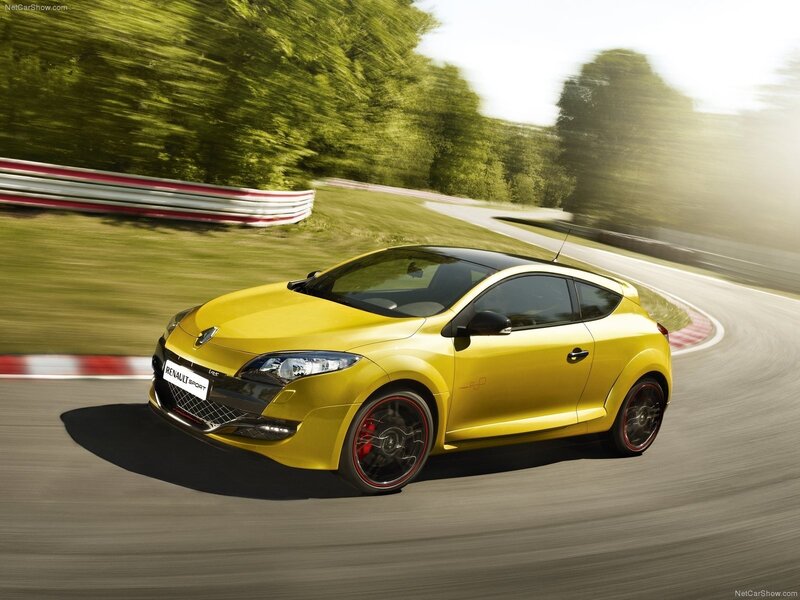 yellow renault sport car on track