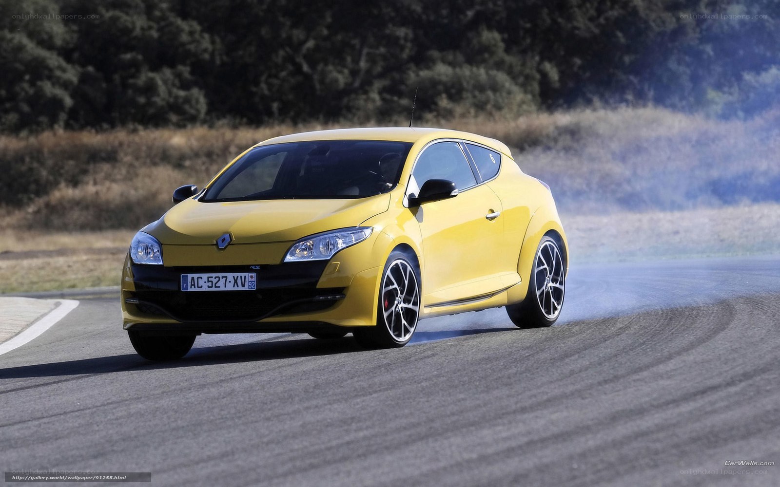 yellow renault sport car