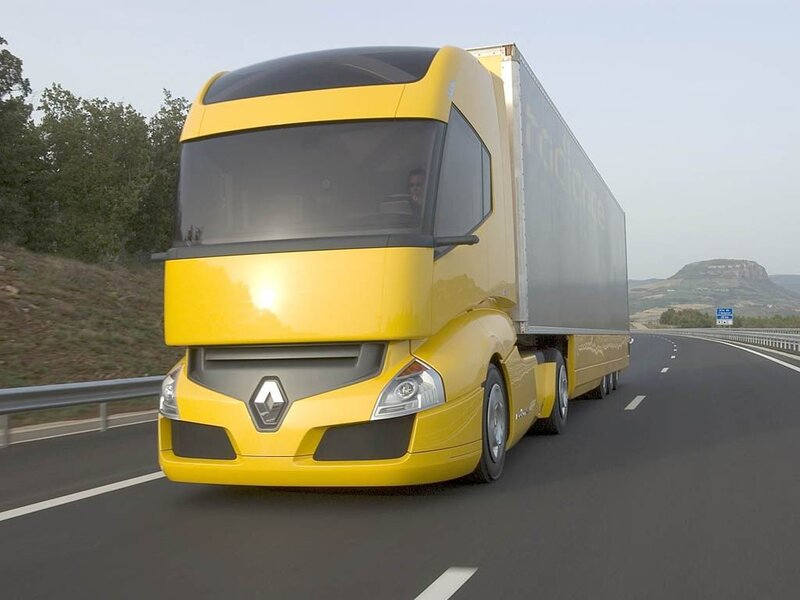 Yellow Renault truck on highway
