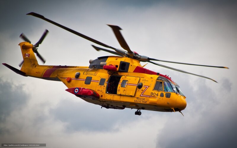 Yellow Rescue Helicopter — Dramatic, Photograph, Clouds, Rotor Blades