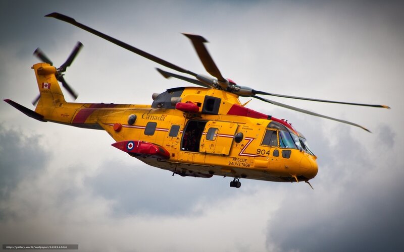 Yellow Rescue Helicopter — Dramatic, Photograph, Clouds