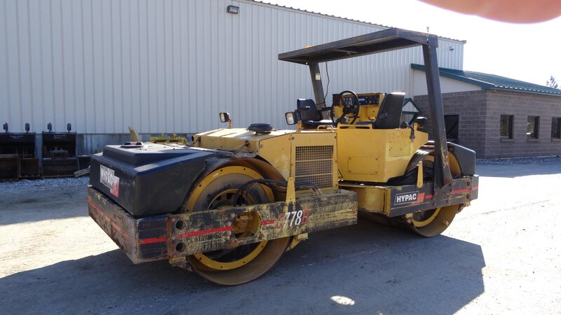 Yellow Road Roller — Neutral, Afternoon, Photograph, Building