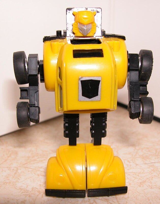 yellow robot toy figure