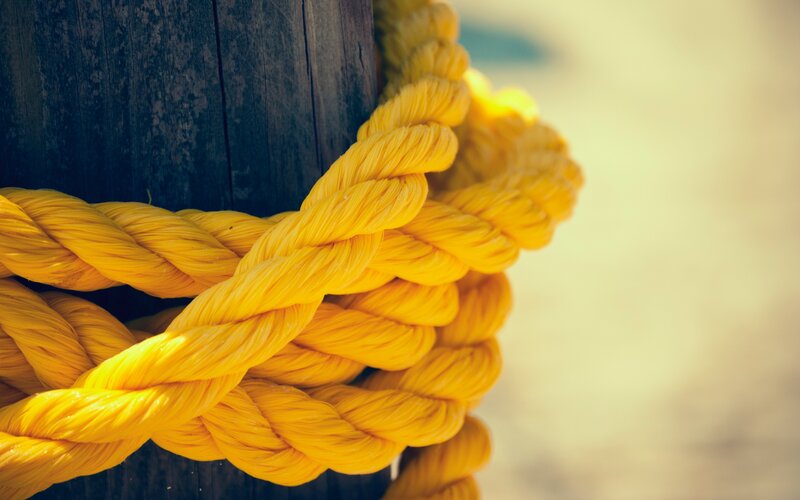 Yellow Rope on Wooden Post — Calm