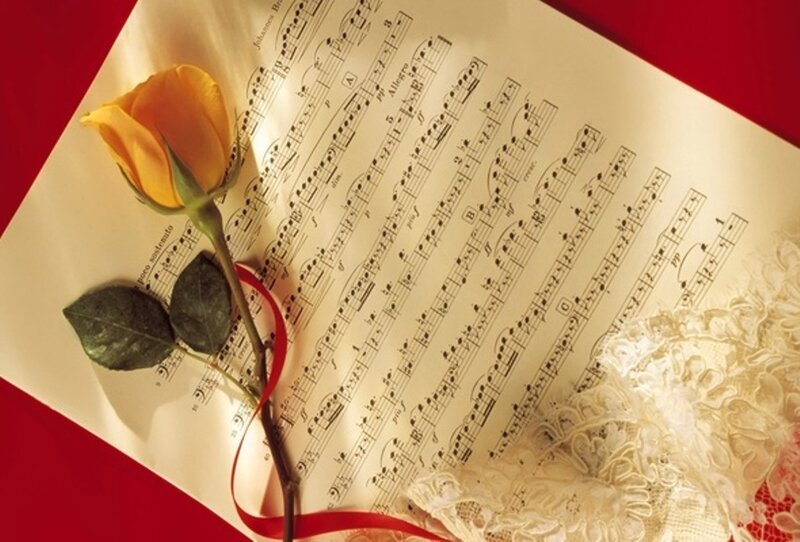 Yellow Rose on Sheet Music — Red
