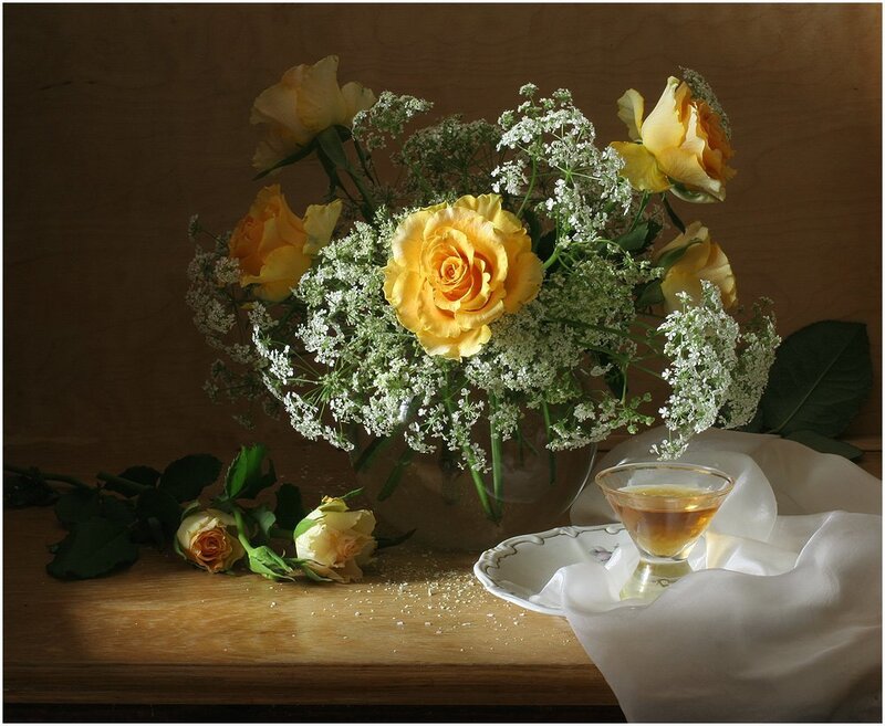 Yellow roses and tea still life