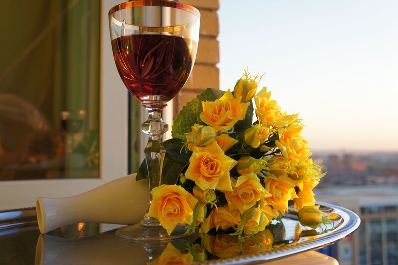 Yellow Roses and Wine Glass