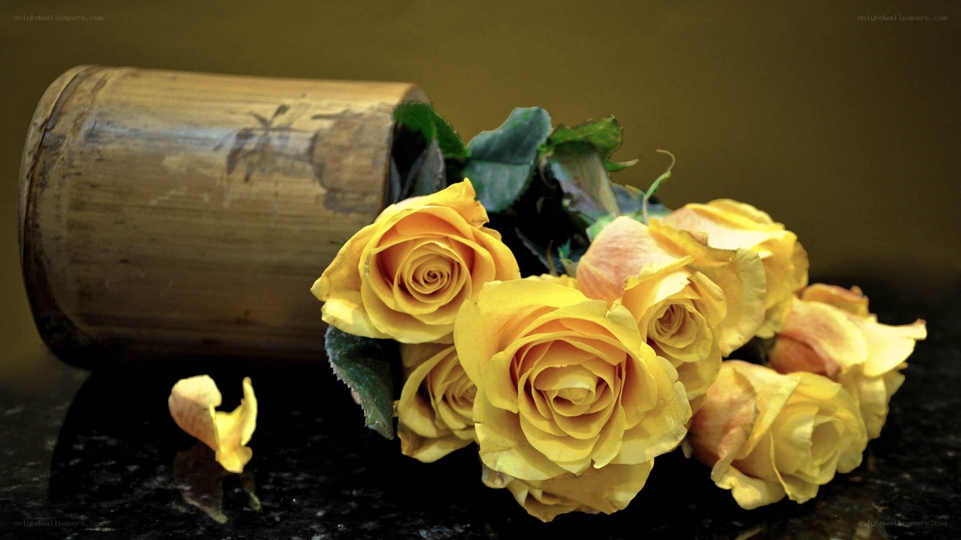 Yellow roses in a bamboo container