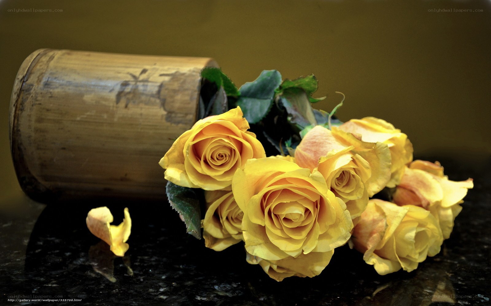 Yellow roses in bamboo container