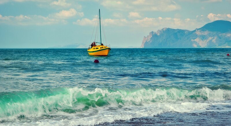 Yellow Sailboat in Sea
