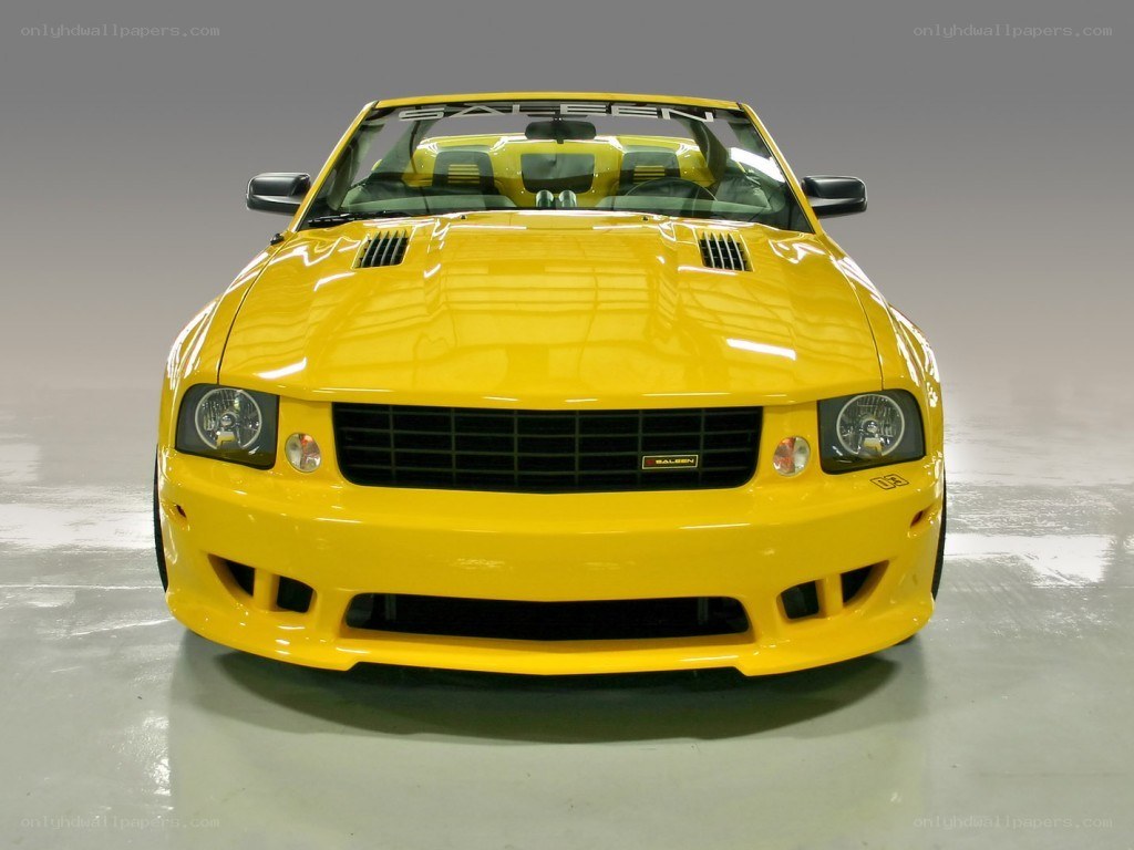 yellow saloon convertible car