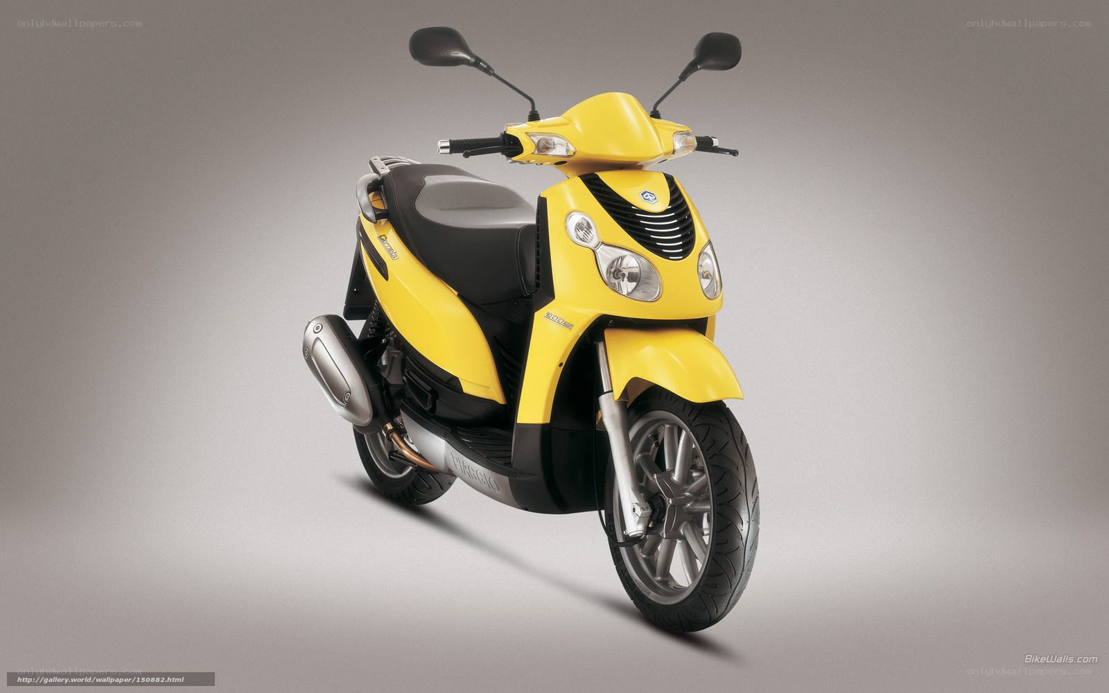 Yellow scooter on gray background