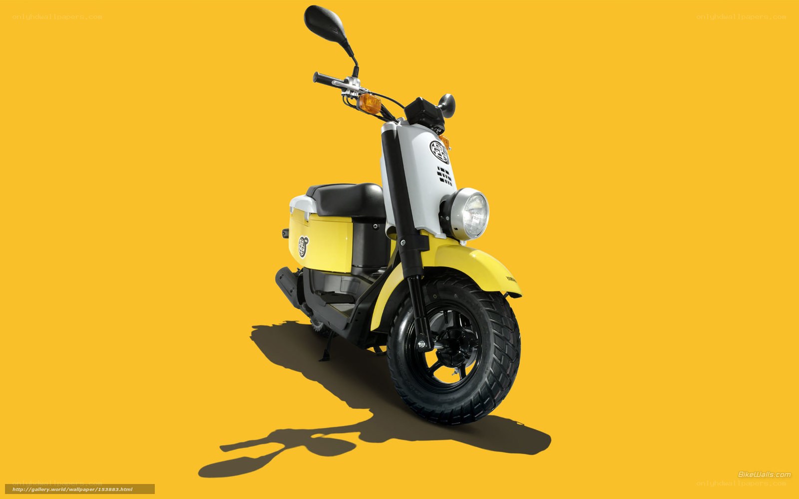 yellow scooter on yellow background
