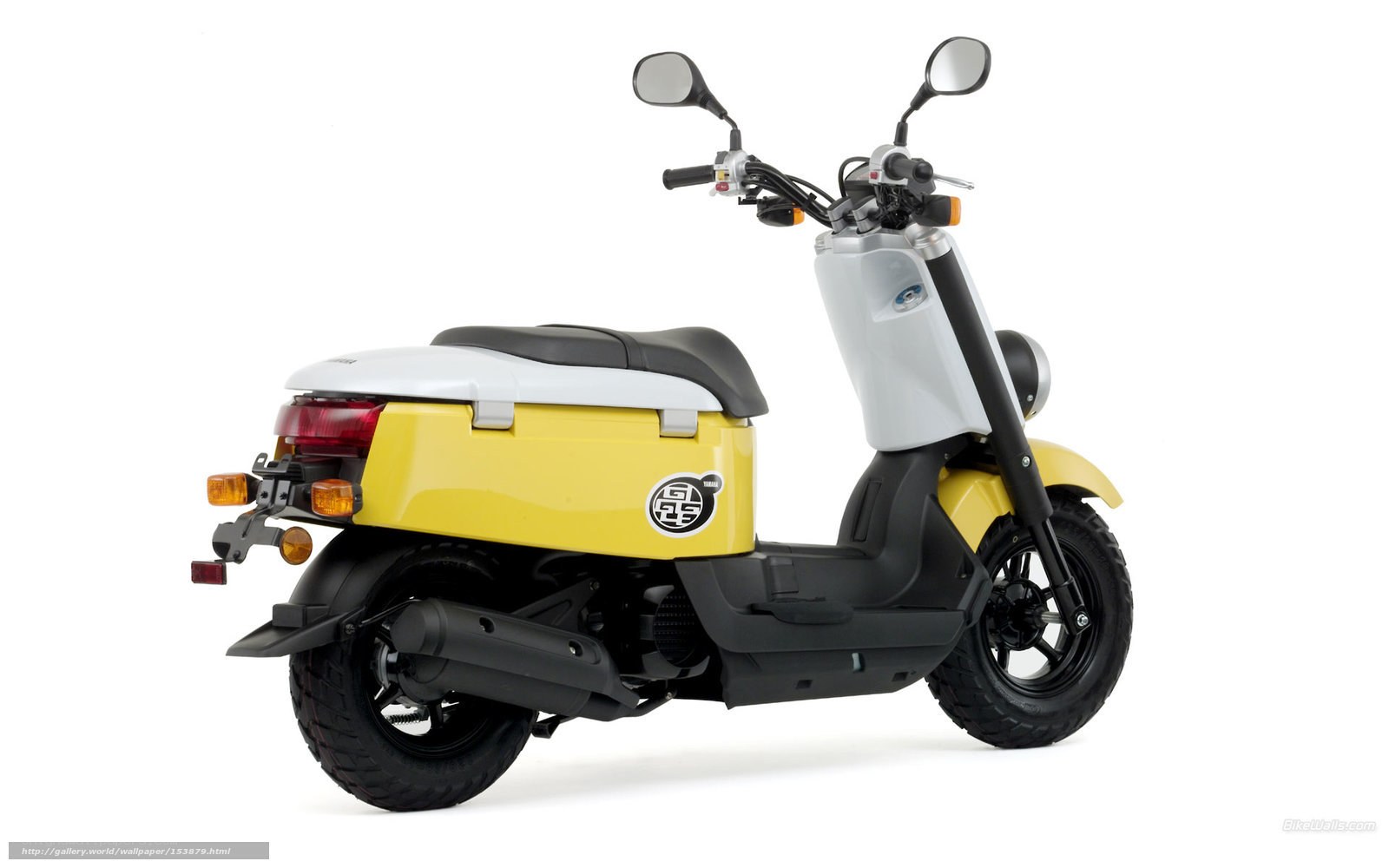 yellow scooter with storage compartment