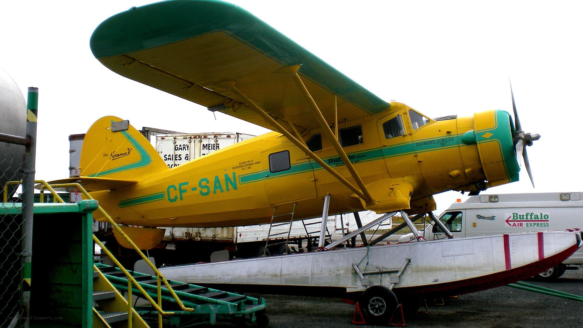 yellow seaplane on display