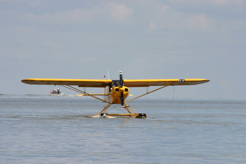 Yellow Seaplane on Water — Calm