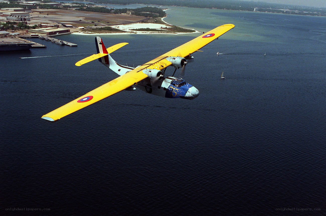 Yellow seaplane over water