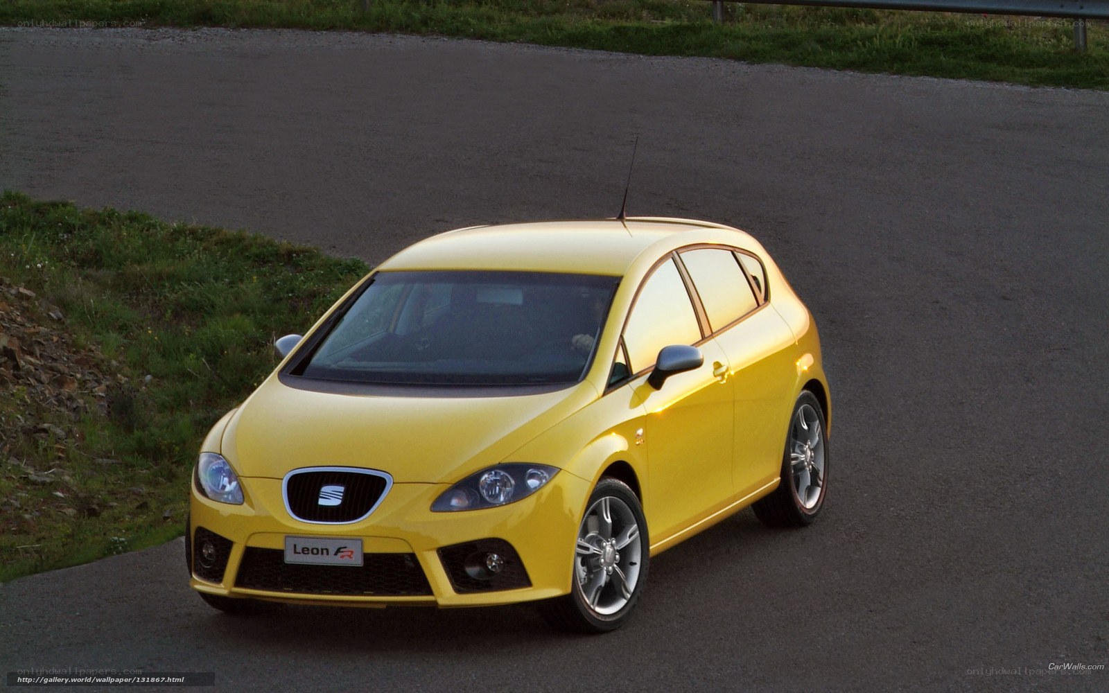 Yellow SEAT Leon FR car