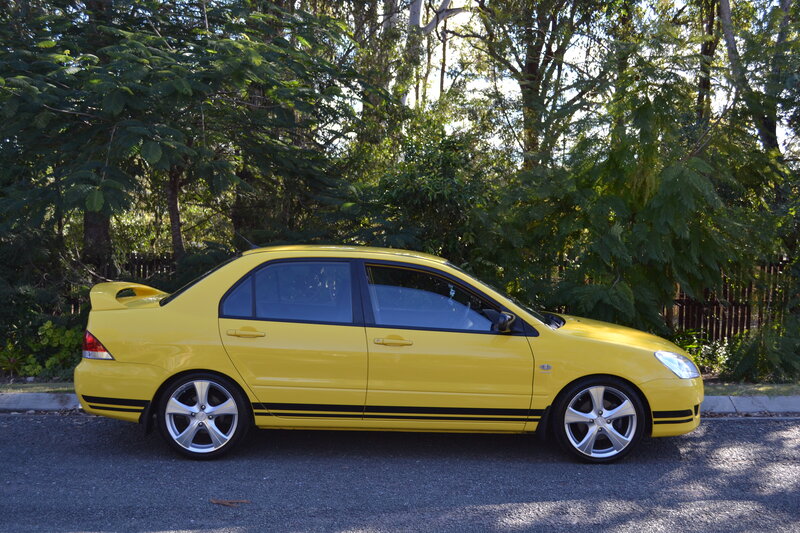 Yellow Sedan Car — Calm