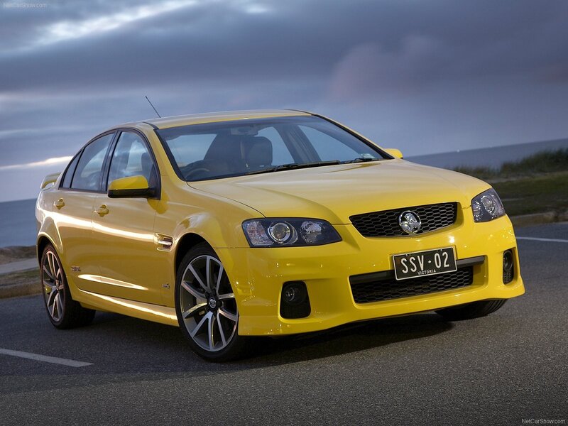Yellow Sedan Car — Dramatic, Sunset