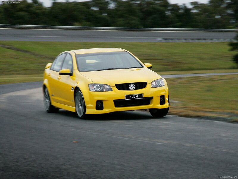 Yellow Sedan Car — Dynamic, Photograph, Race Track
