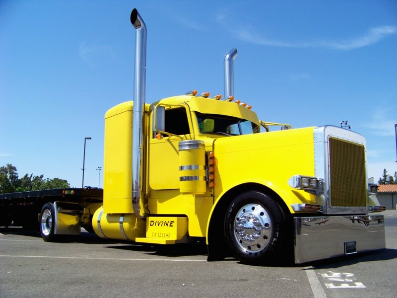 yellow semi-truck with chrome details