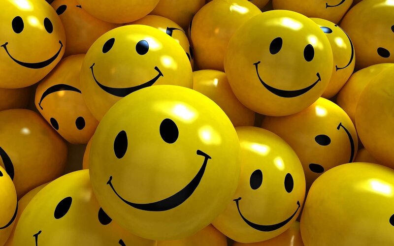 yellow smiley face balloons