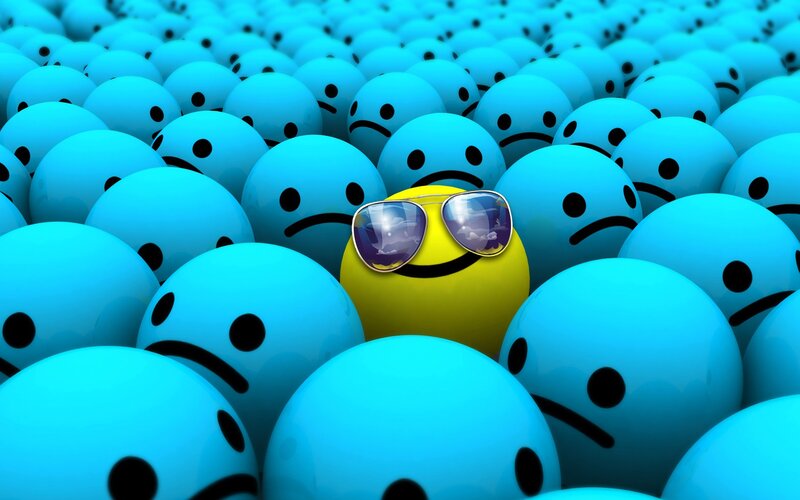 yellow smiley in blue crowd