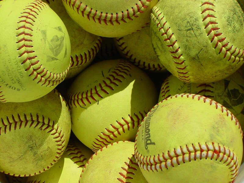 Yellow Softballs in Pile
