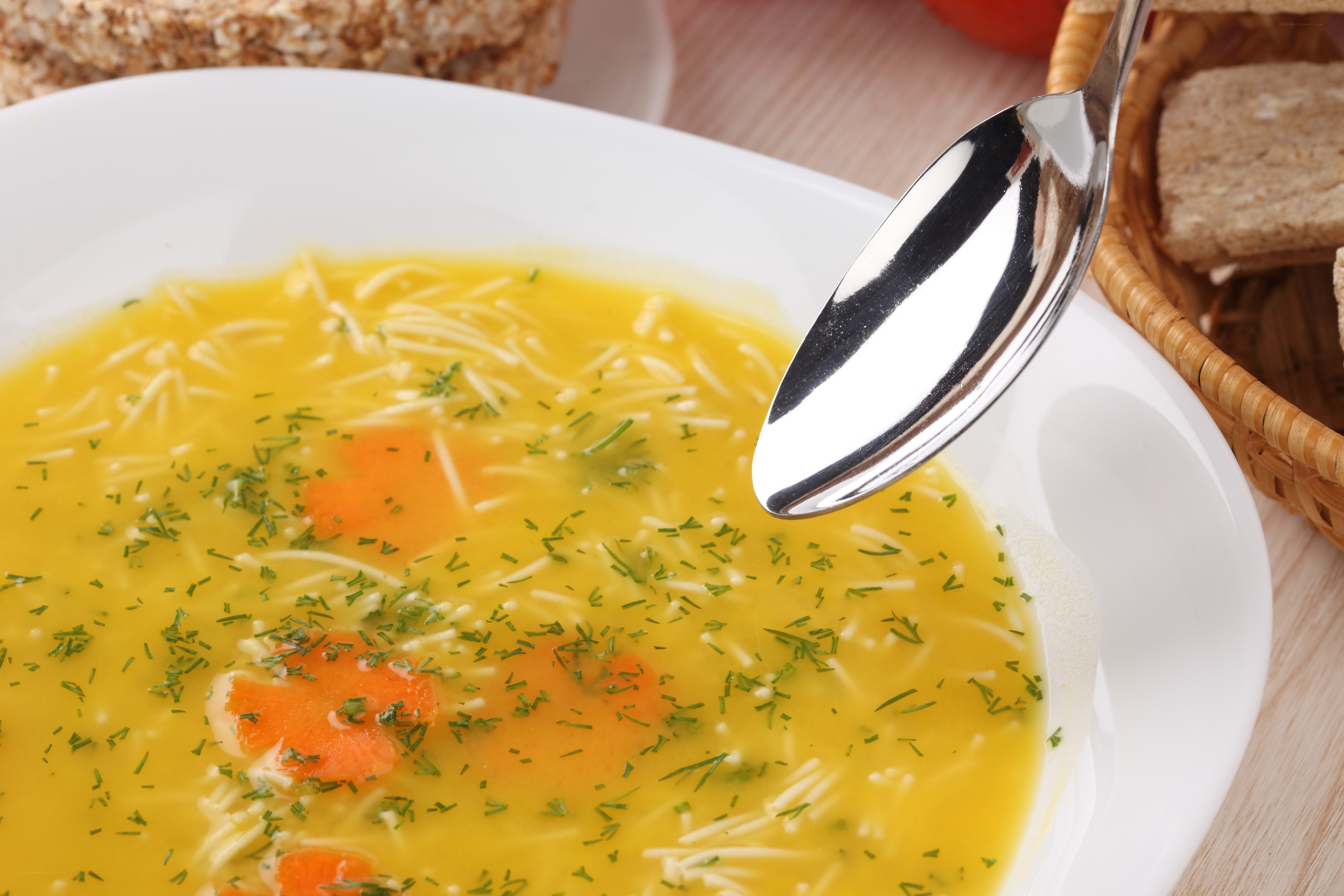 yellow soup with noodles