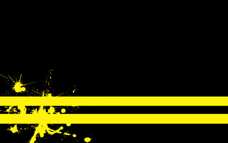yellow splatter on black background