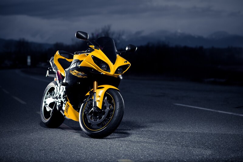 Yellow sport motorcycle on road