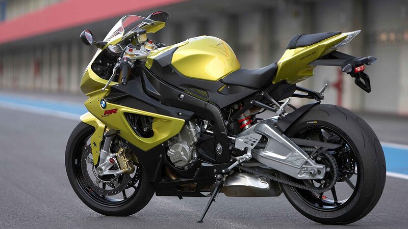 yellow sport motorcycle on track