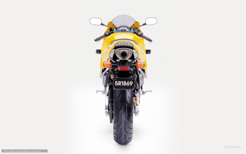 yellow sport motorcycle rear view