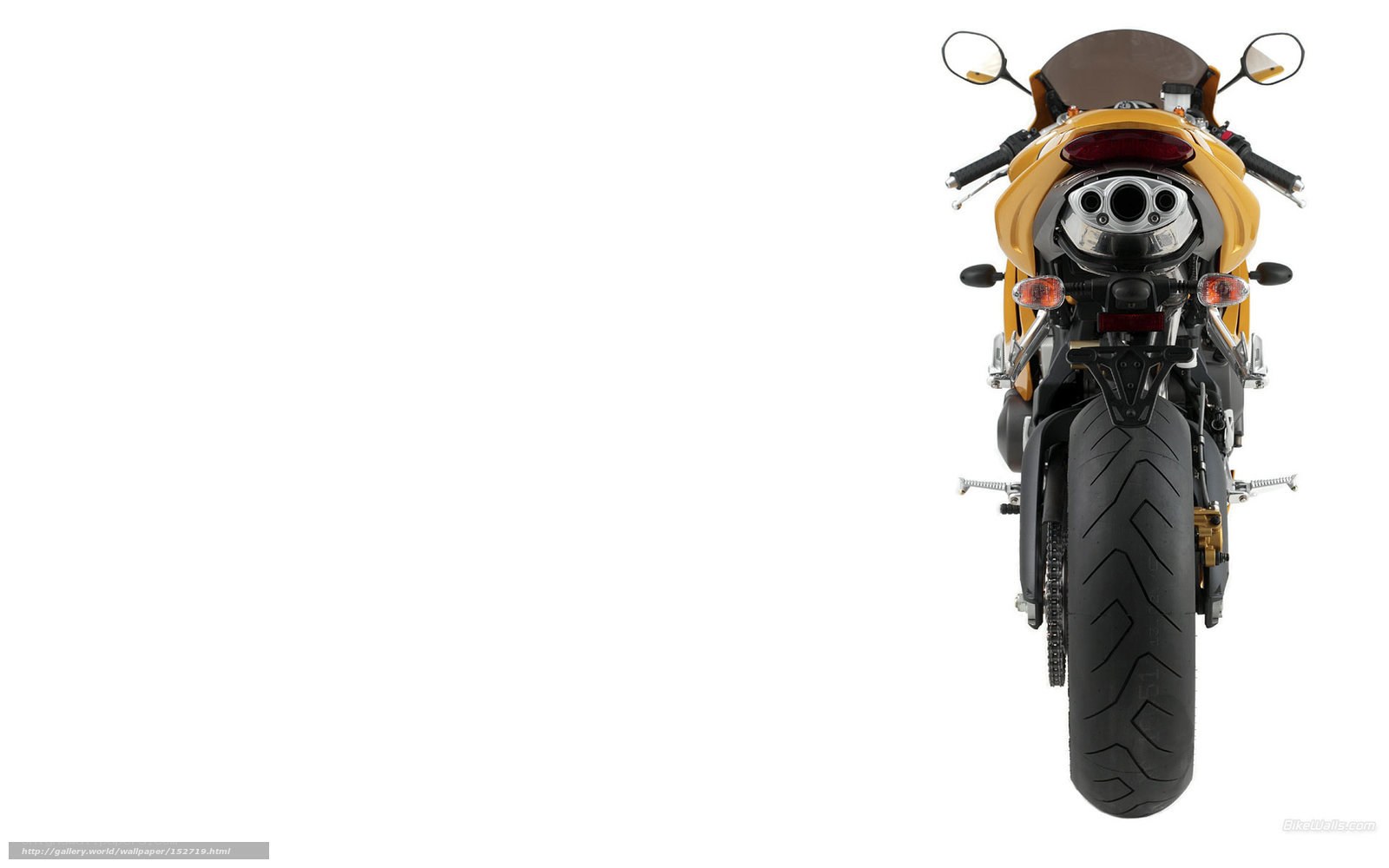 yellow sport motorcycle rear view