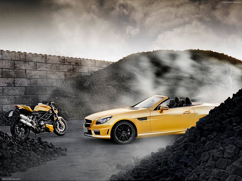 Yellow sports car and motorcycle