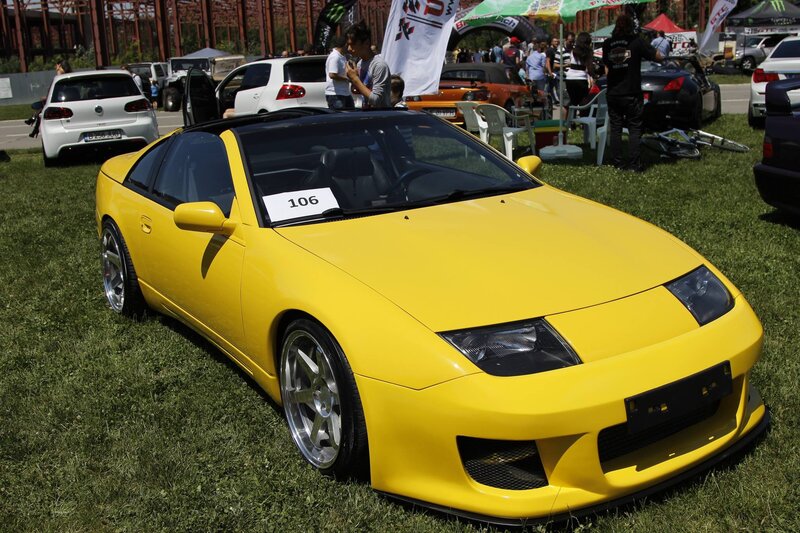 Yellow sports car at a show